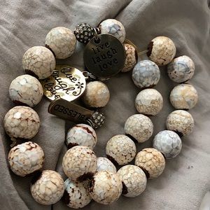 2 very unique bluish/brown as white bracelets.